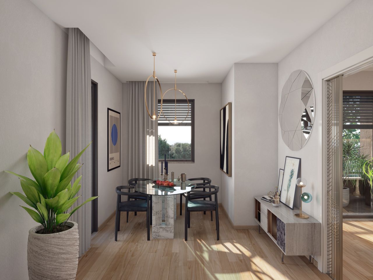 Sala da pranzo di un appartamento del Residence La Fenice: marmo, ottoni e luce naturale